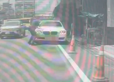 白色BMW拒檢衝撞逃逸！　萬巒分駐所兩警輕微擦傷